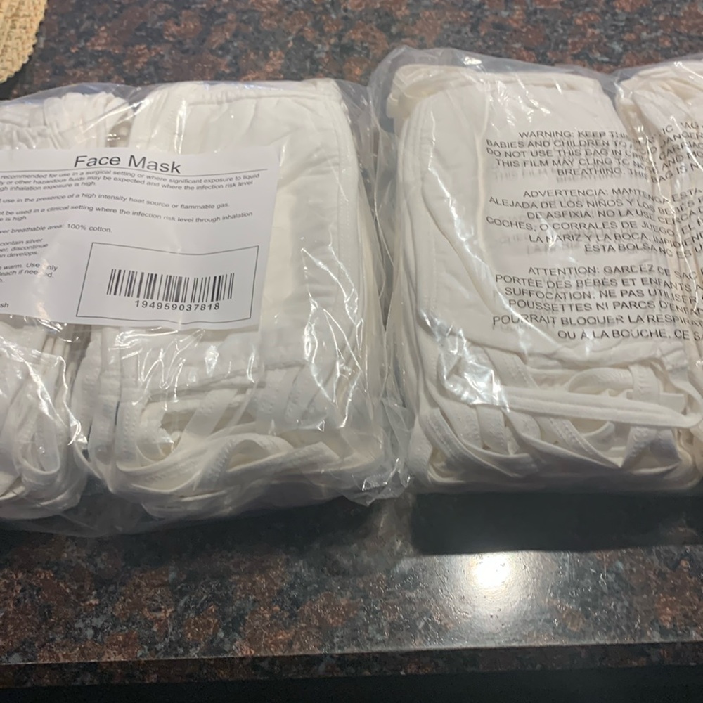 Face mask.  White cotton.  Brand new. Cloth can be used for crafts as well.